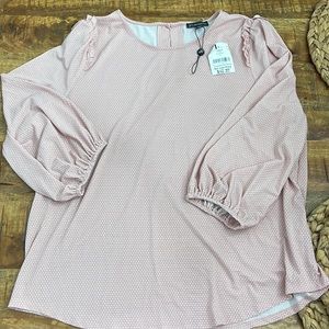 Light pink polka dot shirt